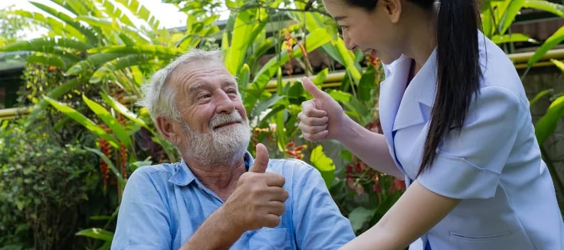 Carer and patient making use of outdoor space