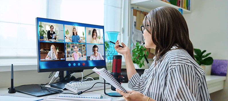 Woman talking into a microphone during a webinar